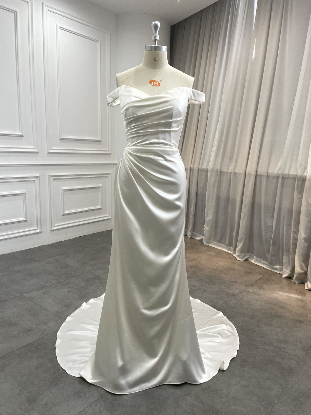Tanzanite off-the-shoulder satin wedding dress, front